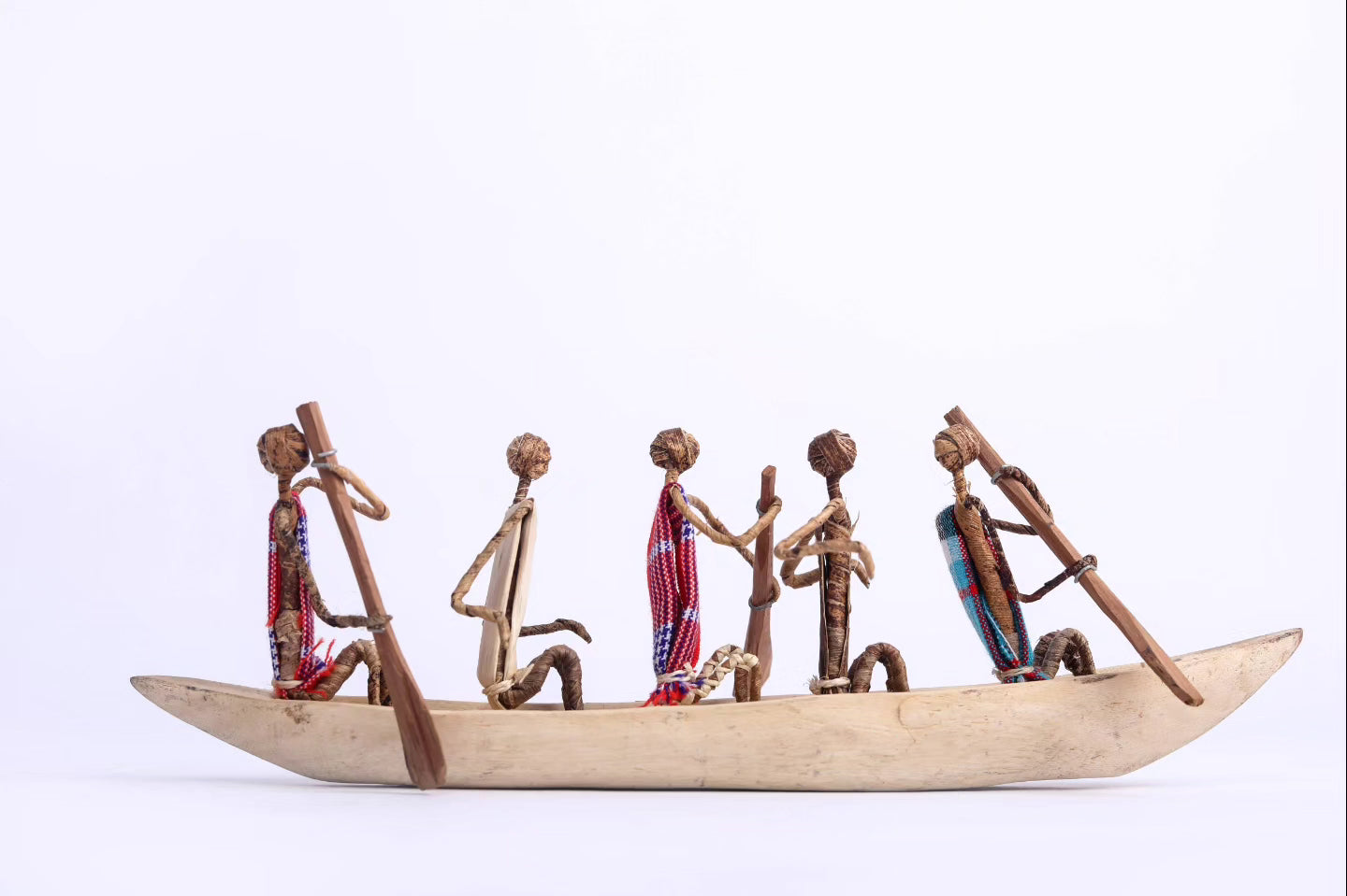 African Canoe + Passengers